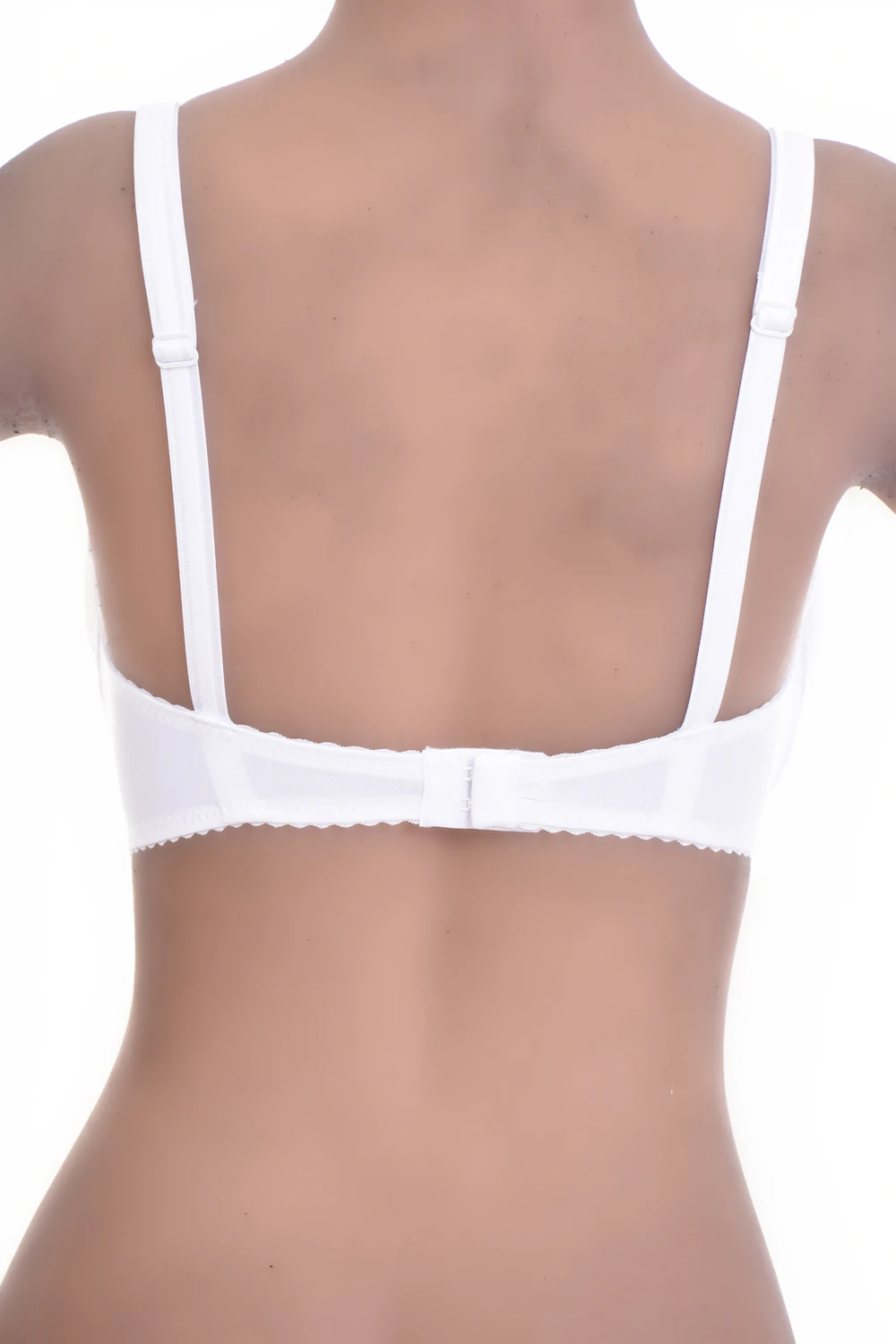 Soft-cup lace bra with a microfiber lower cup that keeps the base smooth and a natural unpadded shape on top.
