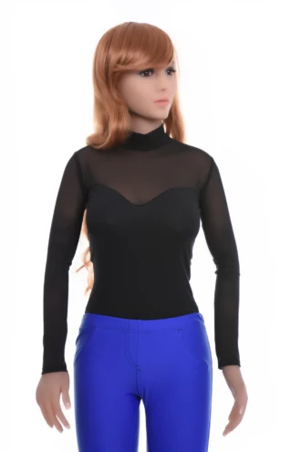 Long-sleeve mock-neck bodysuit with sheer mesh texture over cotton, worn under an open blazer or overshirt.