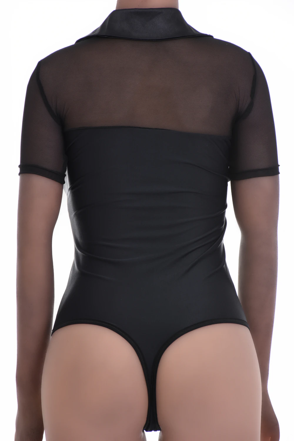 Microfiber-and-mesh blouse bodysuit by Tiara Galiano with a pointed collar and brazilian back, worn under a blazer.