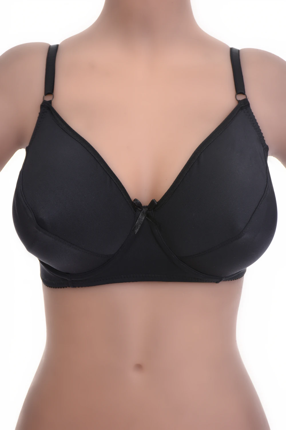 Soft-cup bra in smooth microfiber with a clean line under tops and a flat underband that sits steady all day.