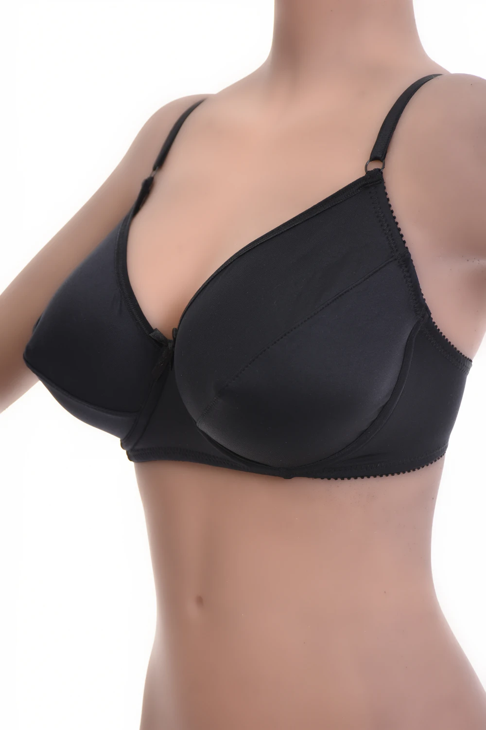 Everyday microfiber soft-cup bra with no padding for a natural line, smooth under close-fitting clothing.