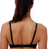 Breathable molded-cup cotton bra with adjustable straps, smooth under T-shirts with a rounded everyday shape.