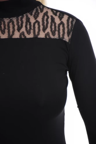 Plain long-sleeve cotton bodysuit with mock neck, a smooth base to build an outfit on.