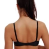 Smooth microfiber bra with molded cups, made to vanish under close tops with adjustable straps and a flat band.