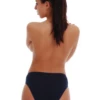Soft cotton bikini briefs by Tiara Galiano with lace side panels over a smooth, opaque body.
