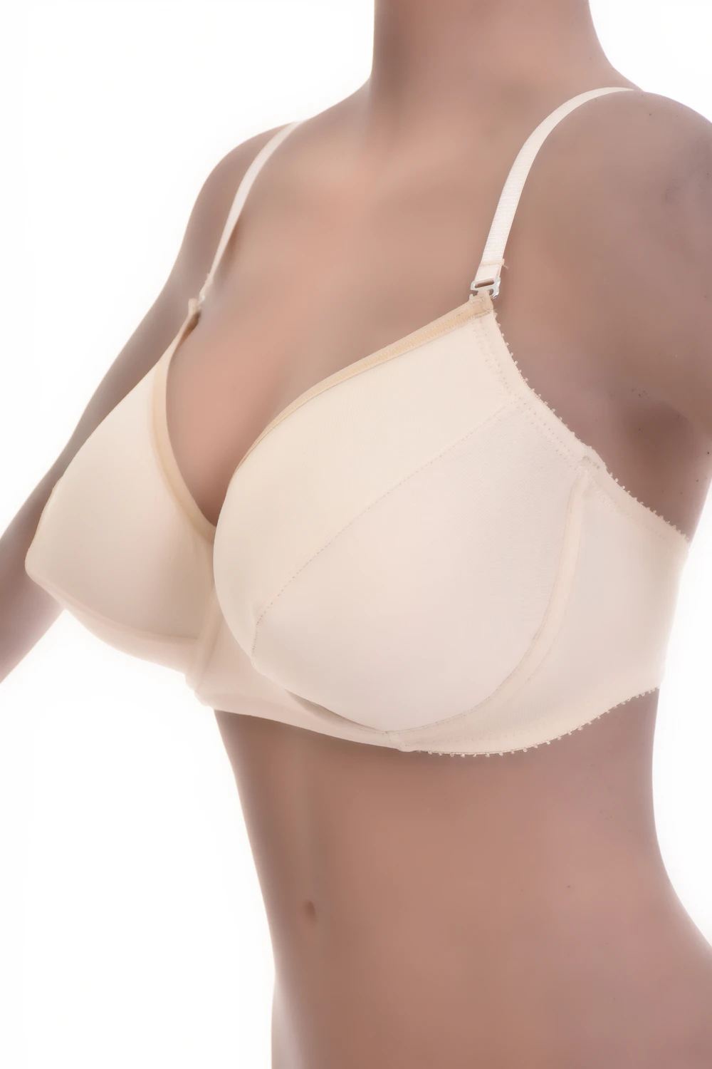Smooth soft-cup microfiber bra with adjustable straps, unpadded for a natural everyday shape under clothing.