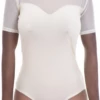 Textured cotton-and-mesh bodysuit with short sleeves and thong back, a base under an open shirt or alone.