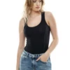 Wide-strap cotton tank bodysuit by Tiara Galiano with scoop neck and brazilian back, a clean everyday base.