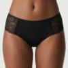 Black cotton boyshorts by Tiara Galiano with floral lace panels at both hips over a smooth breathable cotton-blend base.