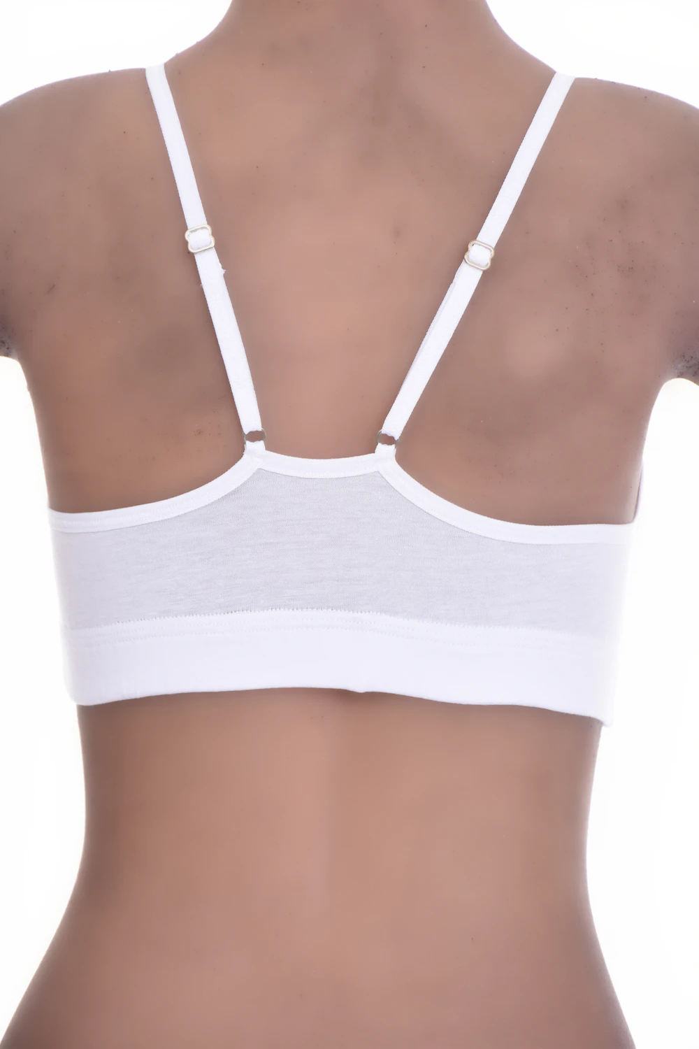 Breathable cotton-blend bralette with a strappy back behind a simple front, soft cups and a low scoop neckline.