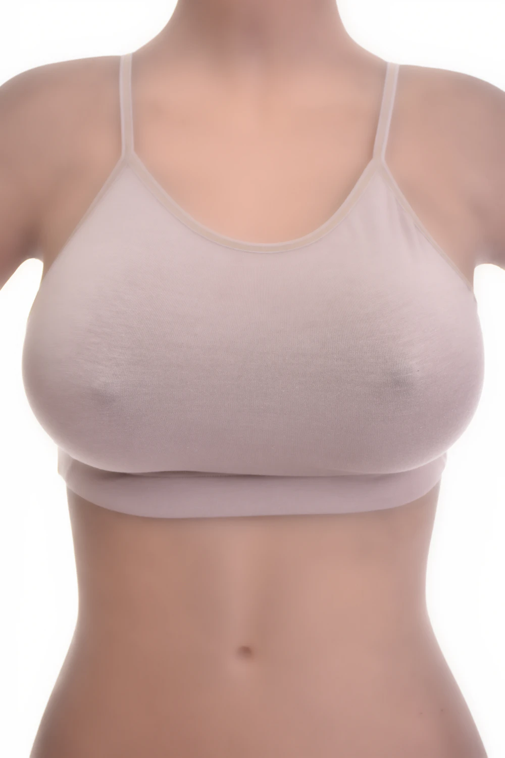 Breathable cotton bralette with a strappy back and a low scoop, light and soft to pull on for everyday wear.