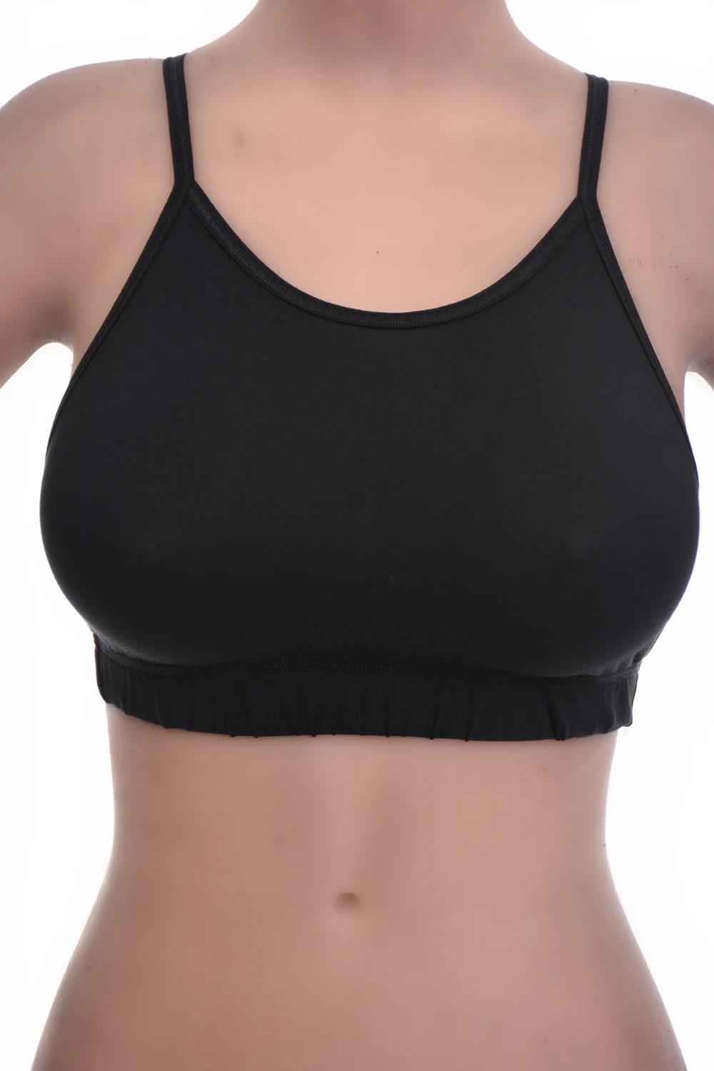 Breathable cotton bralette with a strappy back and a low scoop, soft and light to pull on for gentle support.