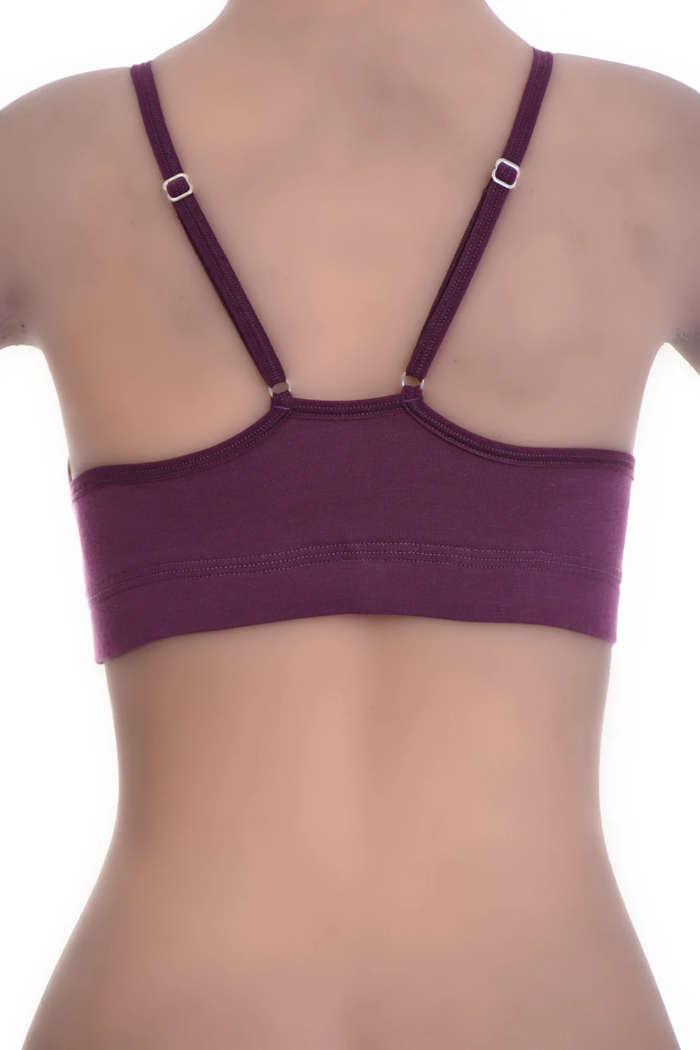 Breathable cotton bralette with a strappy back behind a simple front, soft cups and thin spaghetti straps.