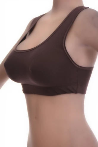 Soft breathable cotton racerback bralette with hidden straps under wider necklines, no wires for gentle support.