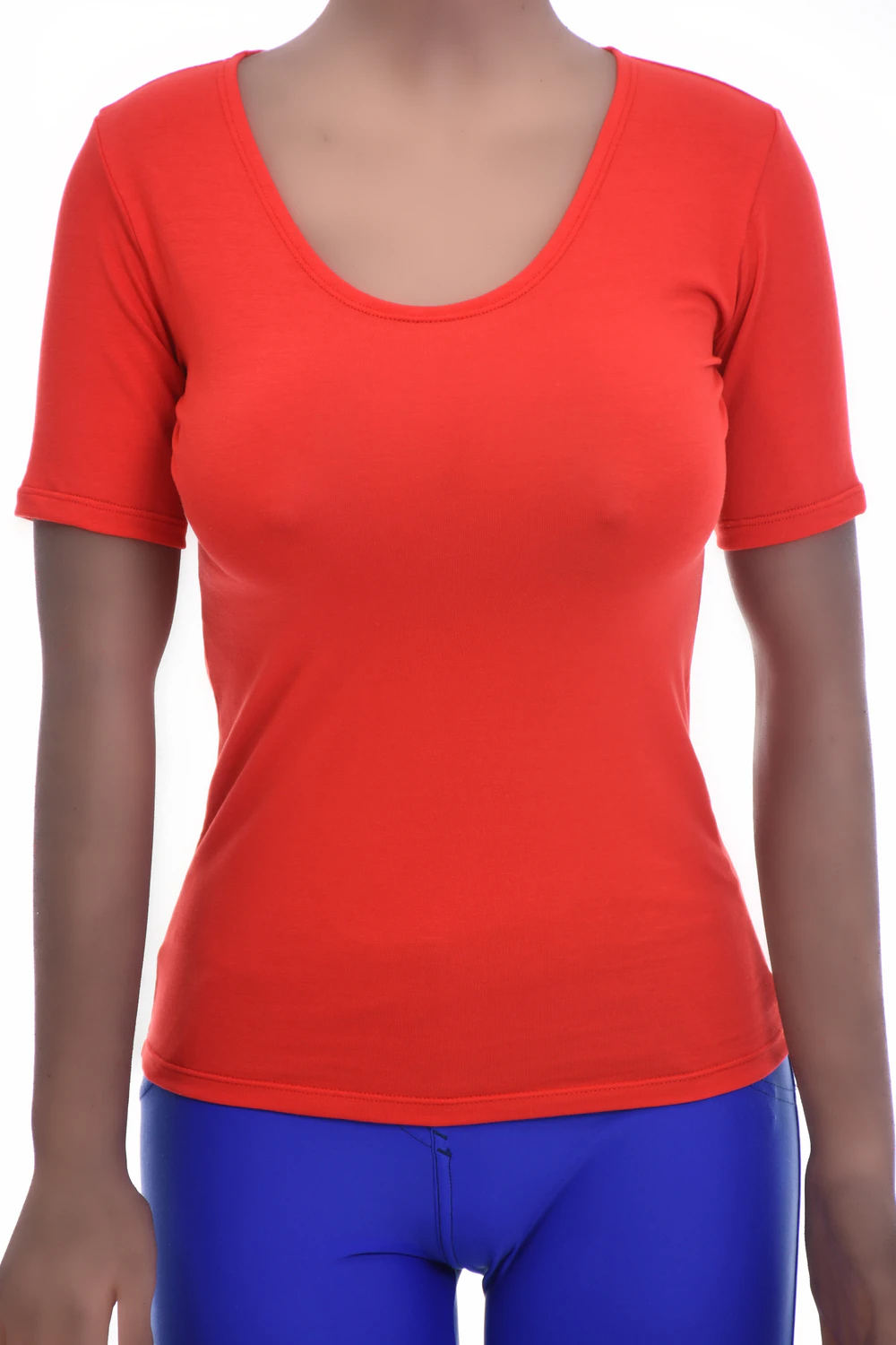 Breathable cotton tee with a fitted line and short sleeves, an easy everyday layer under a cardigan.