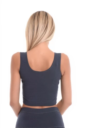 Soft cotton-blend scoop-neck tank with wide flat straps and stretch, a close everyday fit that follows the figure.