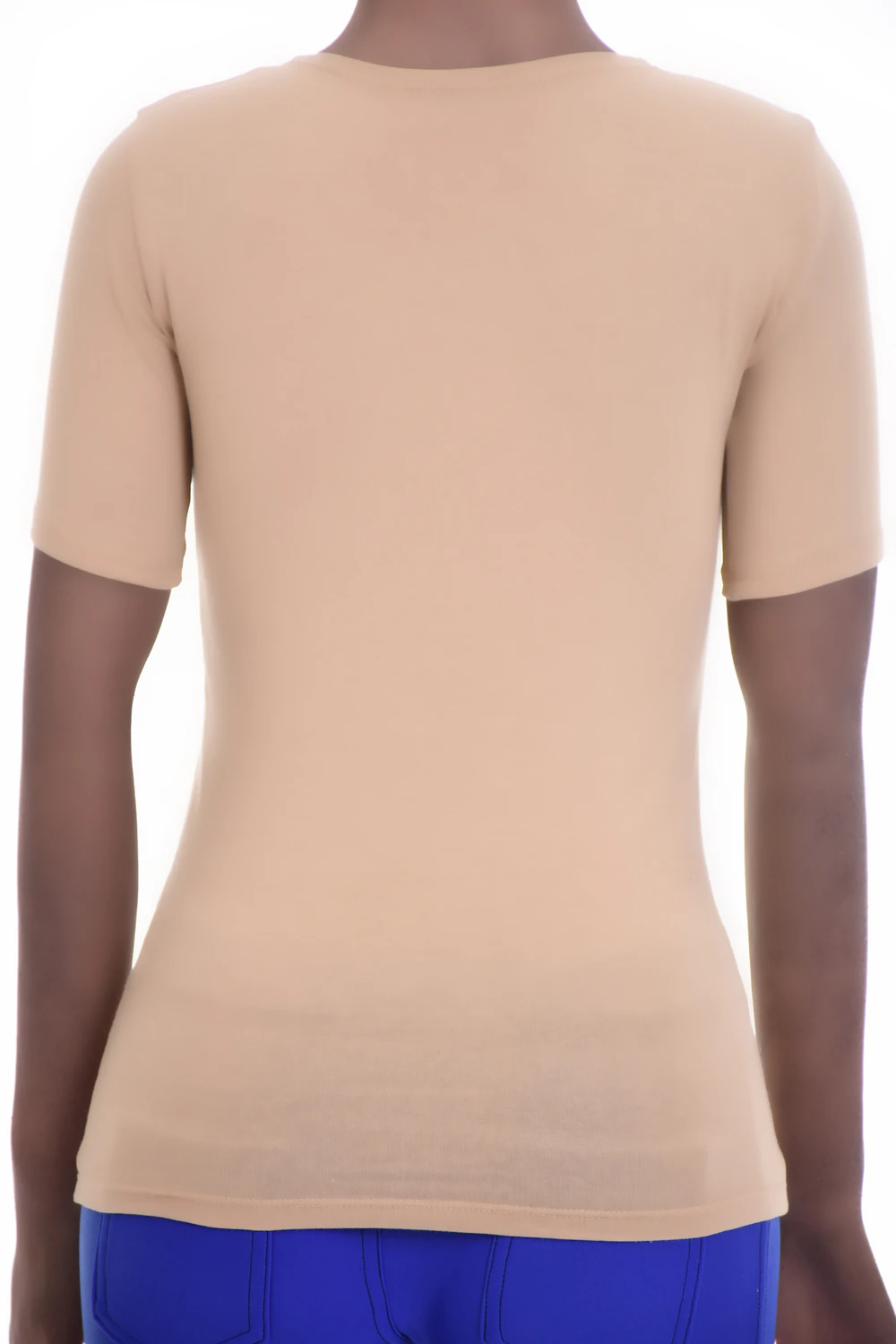 Soft cotton-blend tee with stretch and a low scoop neck, a slim feminine shape that follows the figure.