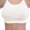 Soft-cup cotton bralette with a low scoop and delicate straps, wireless and breathable for gentle support.