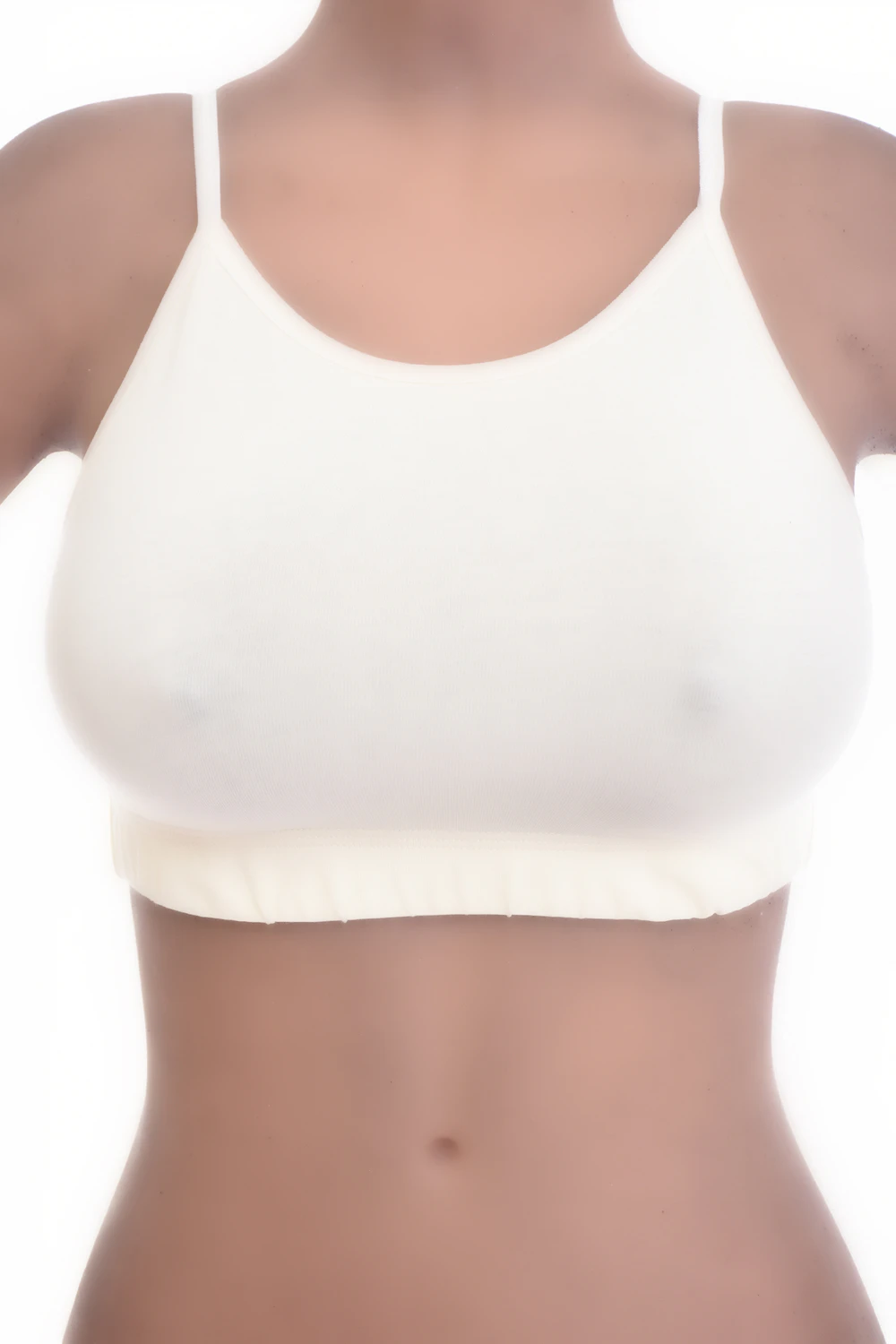 Soft-cup cotton bralette with a low scoop and delicate straps, wireless and breathable for gentle support.