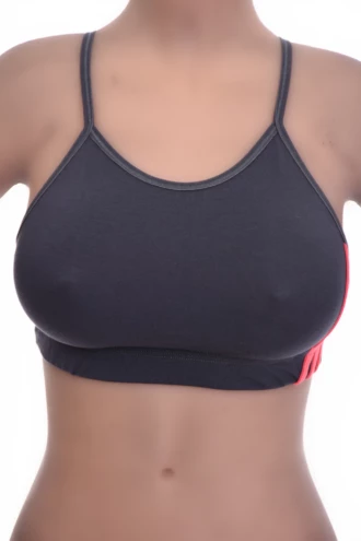 Soft-cup cotton bralette with a low scoop and delicate straps, wireless and breathable following the natural shape.