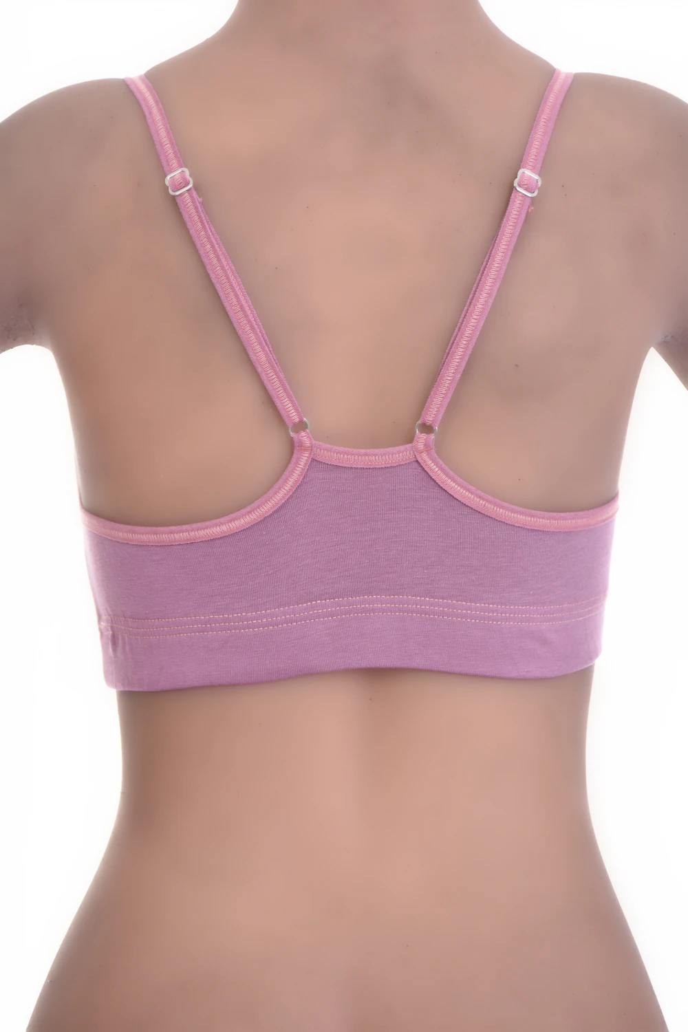 Soft-cup cotton bralette with a low scoop and delicate straps, wireless and breathable following the natural shape.
