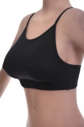Soft cotton bralette with no wires or padding, a low scoop and fine straps for breathable everyday comfort.