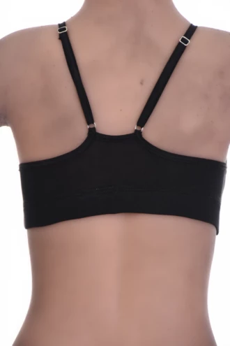 Soft cotton bralette with no wires or padding, a low scoop and fine straps for relaxed everyday comfort.