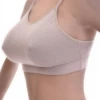 Soft cotton bralette with no wires or padding, a low scoop and fine straps for relaxed everyday comfort.