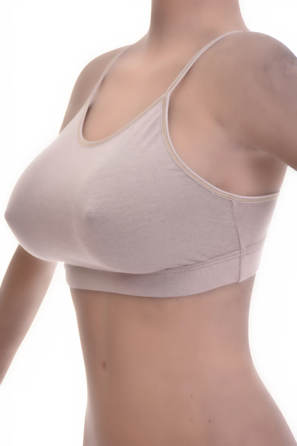 Soft cotton bralette with no wires or padding, a low scoop and fine straps for relaxed everyday comfort.