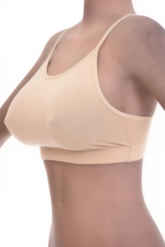 Cotton bralette with no wires or padding and fine spaghetti straps, soft and breathable following the natural shape.
