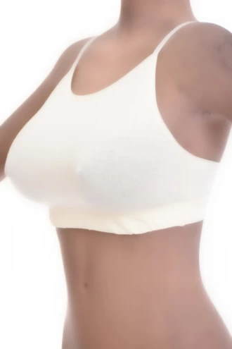 Women's cotton bralette with thin spaghetti straps and a scoop neck, soft wireless cups for everyday comfort.