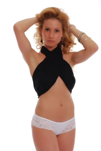 Cotton Brazilian panties with wide floral lace side panels and a smooth cotton centre, a decorative low-rise pair.