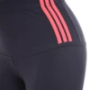 Close-up of anthracite cotton leggings waistband with three coral stripes, showing the fabric texture