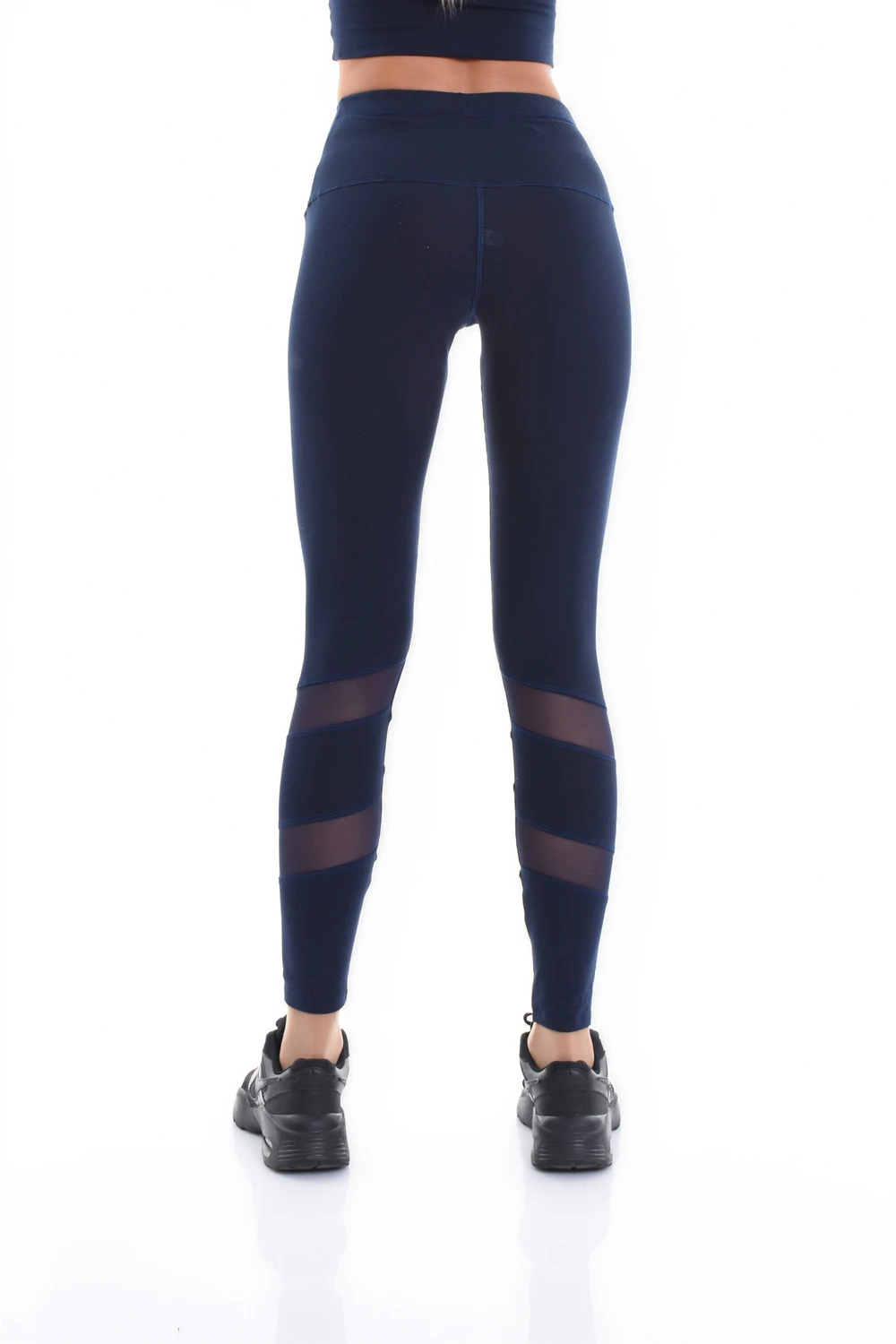 Navy blue high-waisted cotton leggings with calf mesh panels, back view in soft everyday cotton