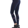 Navy blue high-waisted cotton leggings with calf mesh inserts, side view of the slim everyday fit