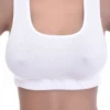 Cotton-blend racerback bralette with a low scoop and wide straps, soft and breathable to layer under a vest.