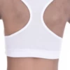 Soft-cup cotton bralette with a racerback keeping straps off the shoulders, breathable for relaxed everyday wear.