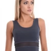 Women's cotton tank with wide straps and a scoop neck, soft and slim for everyday layering under a cardigan.