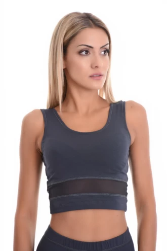 Women's cotton tank with wide straps and a scoop neck, soft and slim for everyday layering under a cardigan.