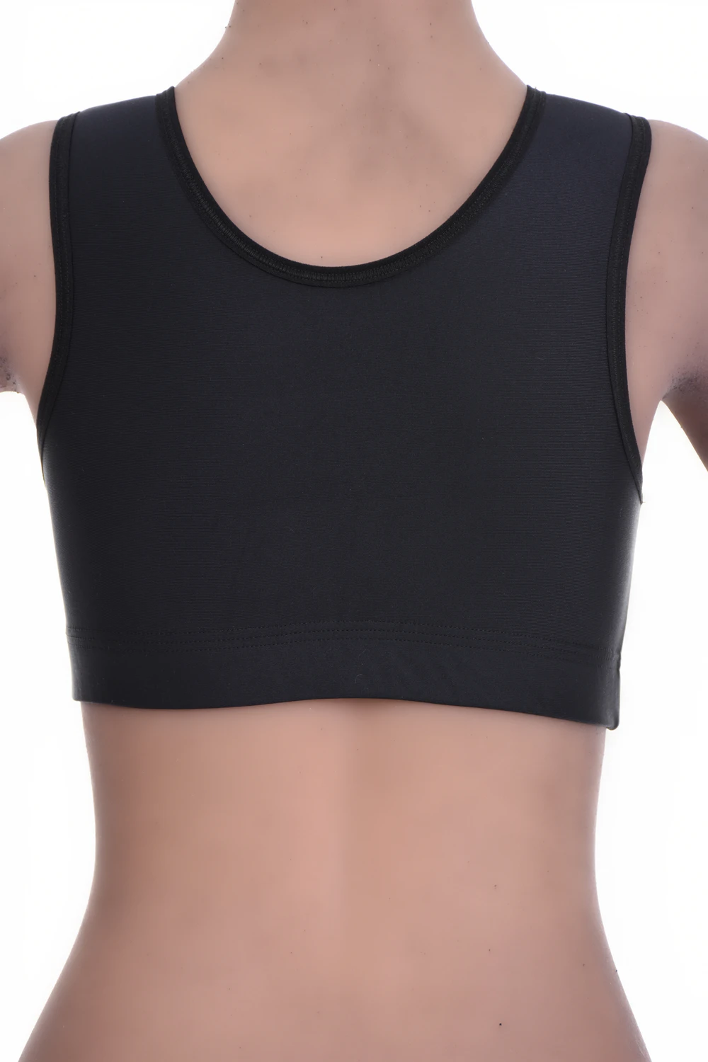 Smooth black microfiber bralette with an open back and wide straps that spread support gently across the shoulders.