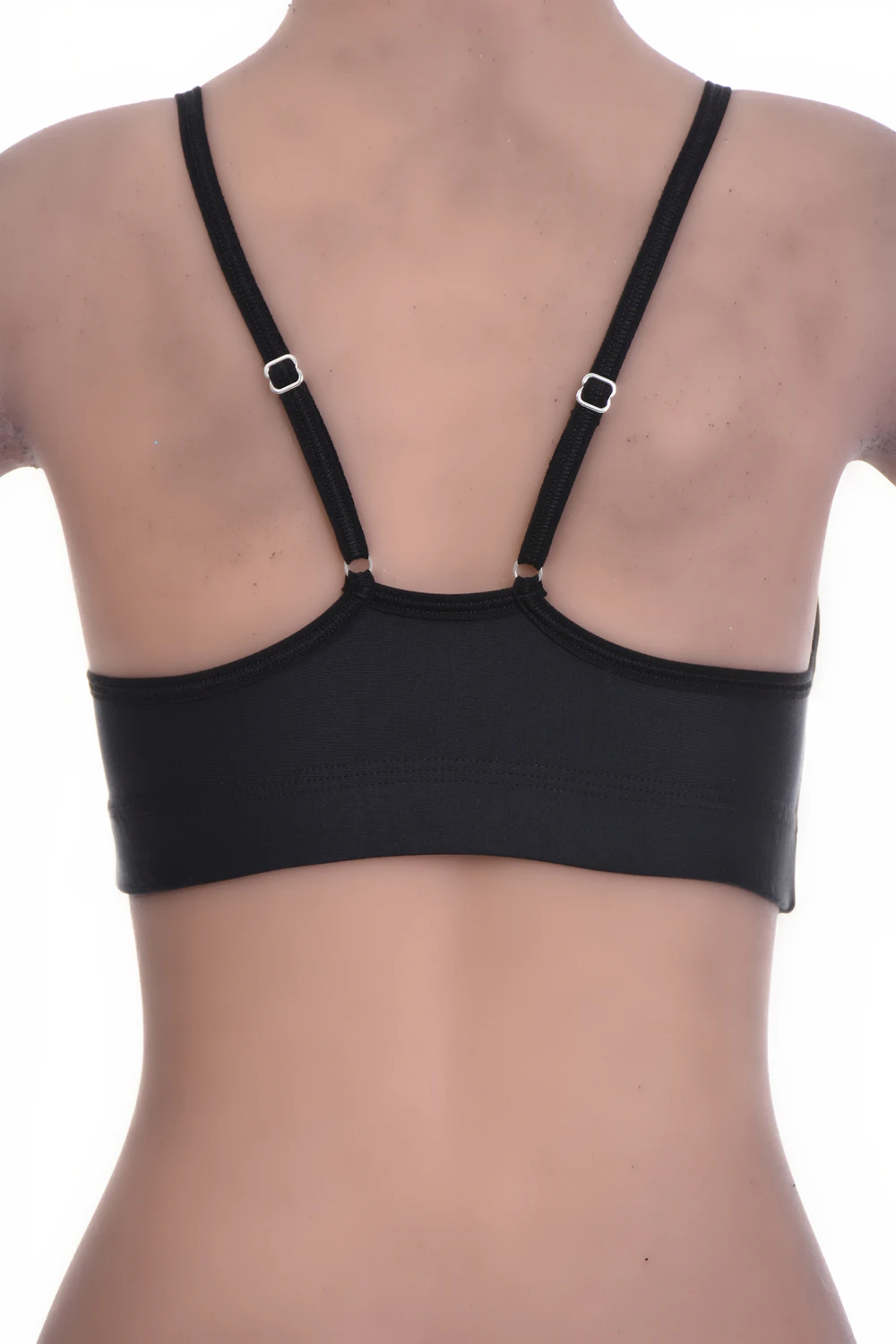 Smooth black microfiber bralette with a strappy back and delicate spaghetti straps, wireless with gentle support.