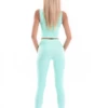 Reseda green high-waisted microfiber leggings, back view with dense smooth fabric along the leg