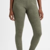 Dark green high-waisted microfiber leggings with a subtle tone-on-tone print, front view of the sleek fit