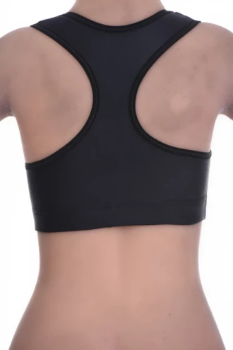 Smooth black microfiber racerback bralette with wide straps drawn in towards the spine, hidden under wider necklines.