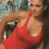 Sleeveless cotton racerback tank with stretch and a scoop neck, an easy pull-on layer for warm weather.