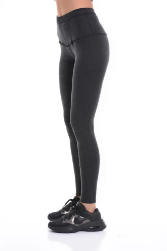 Black high-waisted wool leggings, side view highlighting the warm soft knitted wool fabric