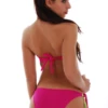 Convertible strapless bandeau top with tie back and adjustable tie-side bikini bottom for women.
