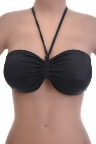 Black bandeau bikini top with a single strap crossing asymmetrically to one shoulder and a soft center gather.