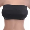 Classic black bandeau bikini top in quick-drying polyamide, a fuss-free strapless style for sunbathing and lounging.