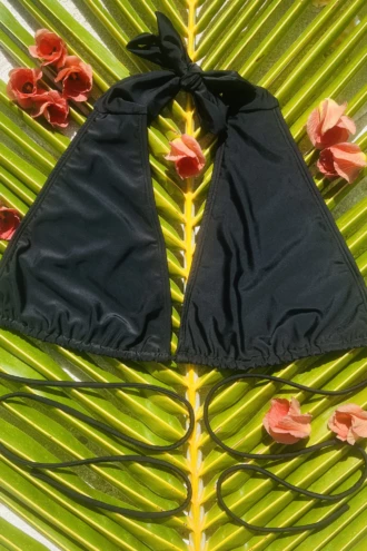 Black halter bikini top in quick-drying polyamide with a lace-up front detail, light and easy for the beach.